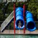 Roosevelt Park Pool: Girl on water slide, summer fun at a pool.