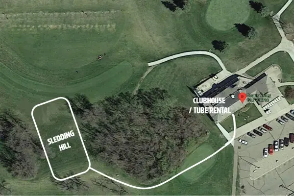 An overhead shot of Souris Valley Golf Course, displaying the proximity of the sledding hill to the clubhouse and highlighting the path to get there.